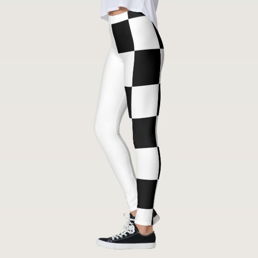 Witte en zwarte halve en halve controleur leggings (Links)
