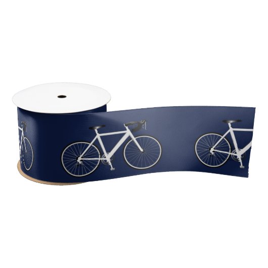 Witte fiets op het ribbon van het blauw marineslak lint (Spoel)