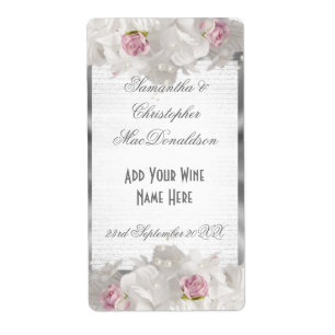 Witte florale roze en zilverkleurige trouwwijn fle etiket