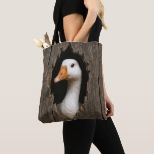 Witte gans gluren uit grillig houten gat draagtas