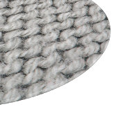 Witte gebreide woltextuur, close-up foto. snijplank (Hoek)