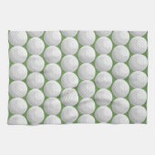 witte golfballen op groen theedoek (Horizontaal)