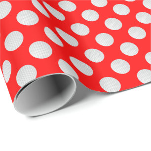 Witte golfballen op rood cadeaupapier