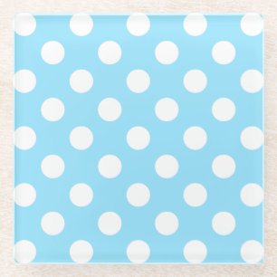 Witte haarpunten op bleek blauw glazen onderzetter