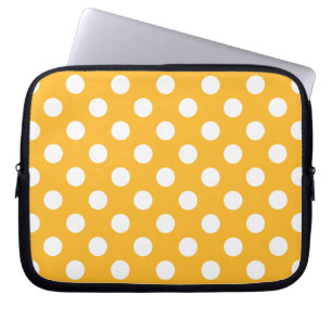 Witte haarvlekken op geel laptop sleeve