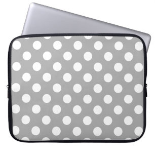 Witte haarvlekken op grijs laptop sleeve