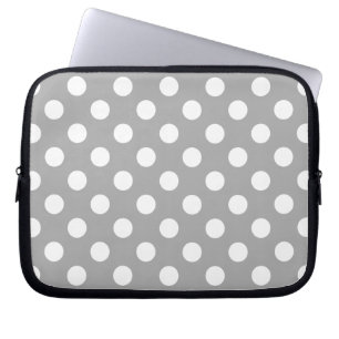Witte haarvlekken op grijs laptop sleeve
