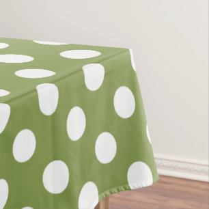Witte haarvlekken op olijfgroen tafelkleed
