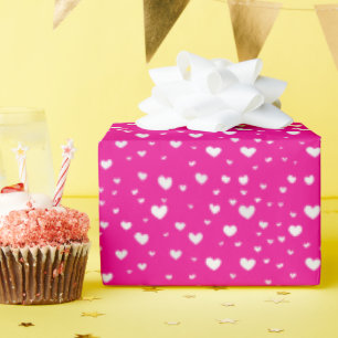 Witte hitte op neonroze cadeaupapier