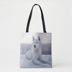Witte hondje in de sneeuw draagtas