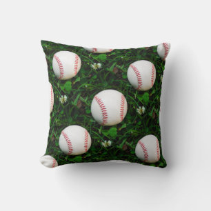 Witte honkbal met rode stiksels kussen