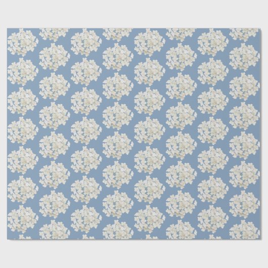 Witte hydrangea op pastblauw cadeaupapier (Vlak)