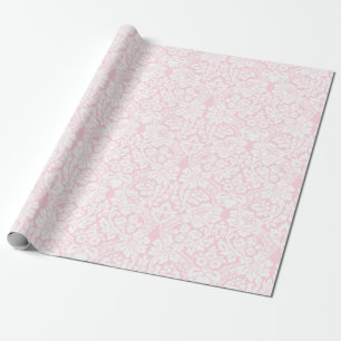 Witte kant op roze cadeaupapier