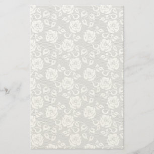 Witte kant patroon op grijze achtergrond briefpapier