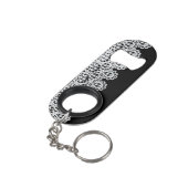 Witte kant vormt een delicate grens tegen zwart mini flessenopener (Achterkant Gekanteld)