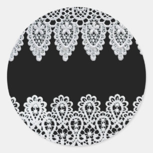 Witte kant vormt een delicate grens tegen zwart ronde sticker