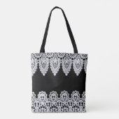 Witte kant vormt een delicate grens tegen zwart tote bag (Achterkant)