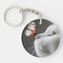 Witte kat met vlinder sleutelhanger