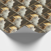 Witte kat zit in warme lamp cadeaupapier (Hoek)
