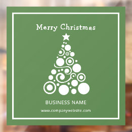 Witte kerstboom op een groene ondergrond raamsticker
