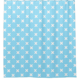 Witte kruisstiften op babyblauw douchegordijn