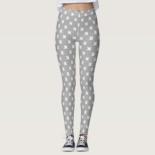 Witte kruisstiften op grijs leggings (Voorkant)