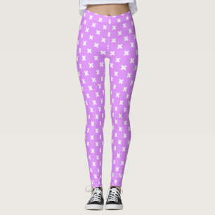 Witte kruisstiften op lila leggings
