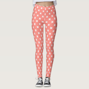 Witte kruisstiften op perziken leggings