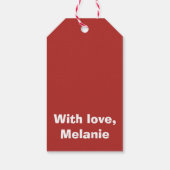 Witte kruisstiften op rood cadeaulabel (Achterkant)