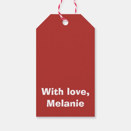 Witte kruisstiften op rood cadeaulabel (Achterkant)