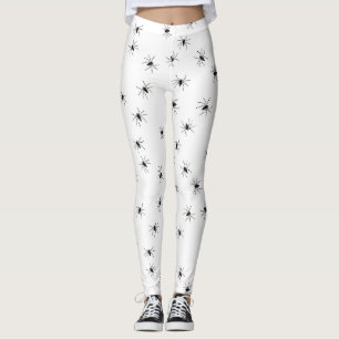 Witte legging gevuld met zwarte spinnen