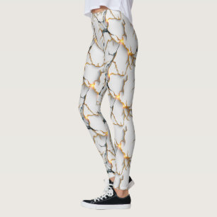 Witte marmertextuur met gloeiende gouden aders leggings