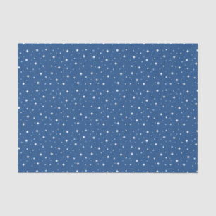 Witte mousserende sterren op blauw tissuepapier