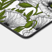 Witte papaver op wit bureaumat (Hoek)