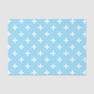 Witte polka kruist op babyblauw tissuepapier
