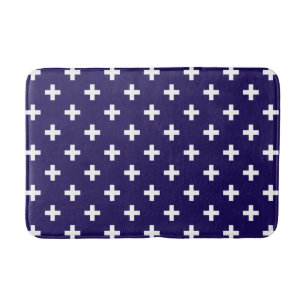 Witte polka kruist op marineblauw badmat