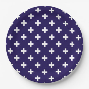 Witte polka kruist op marineblauw papieren bordje