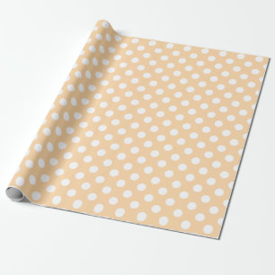 Witte polka-stippen op beige cadeaupapier