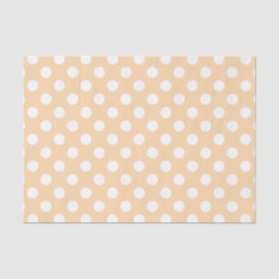 Witte polka-stippen op beige tissuepapier
