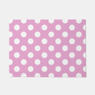 Witte polka stippen op bleek roze deurmat