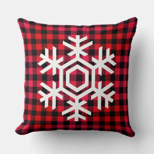 Witte sneeuwvlok op warm rood tartan patroon kussen