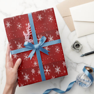 Witte sneeuwvlokken en rood achtergrondpapier cadeaupapier