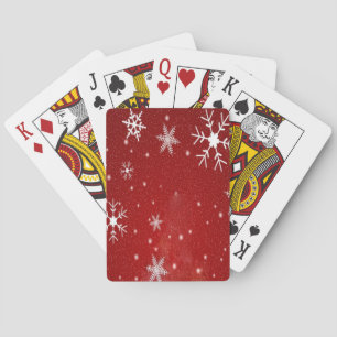 Witte sneeuwvlokken met rode achtergrond pokerkaarten