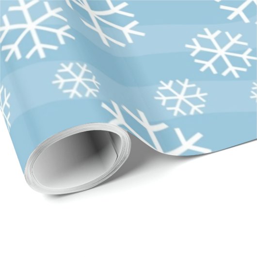 Witte sneeuwvlokken op blauw cadeaupapier (Rol Hoek)