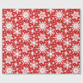 Witte sneeuwvlokken op rood cadeaupapier (Vlak)