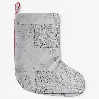 Witte steenwand kleine kerstsok