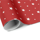 Witte sterren op rood cadeaupapier (Rol Hoek)