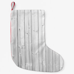 Witte textuurhouten oppervlak kleine kerstsok