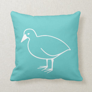 Witte vogel op blauwgroen blauw kussen