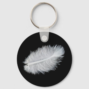 Witte vogelveer sleutelhanger
